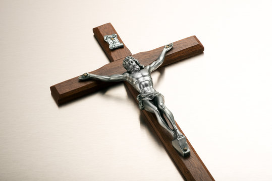Silver metal Christ on a wooden crucifix