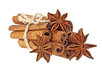 Anise and cinnamon sticks isolated on white background