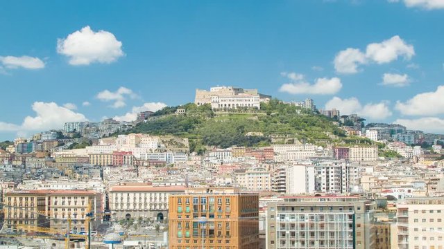 Castel Saint Elmo with Historical City Buildings in Naples Italy on a Sunny Day with Blue Sky and White Clouds