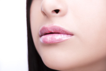 Fototapeta premium Sexy Lips. Beauty Lipgloss Makeup Detail. Beautiful Make-up Clos