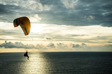 Flying is by a parachuting and float on sea