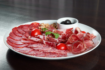 Assorted cold meat deli plate at the restaurant