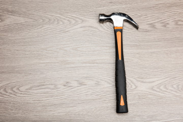 The repair tools is placed on the wooden table.