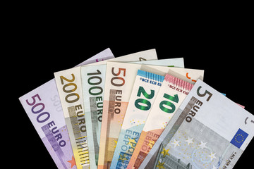 euro banknotes isolated on black