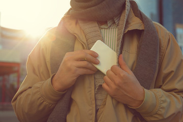 Modern guy using cellphone.