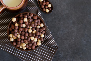 Healthy breakfast. Chocolate breakfast cereal with milk.
