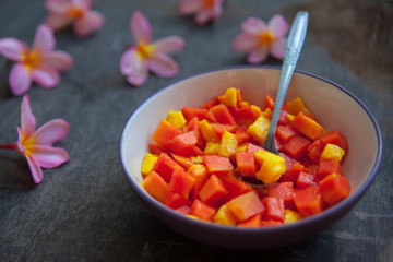 Healthy vegan breakfast of raw tropical fruits.