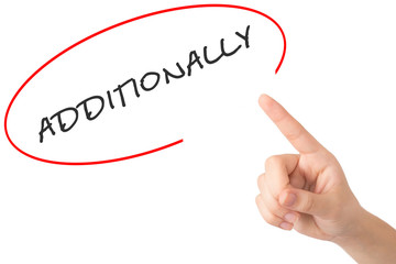 Hand of a young girl points to a word