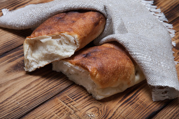 Georgian bread on a light wooden table or board