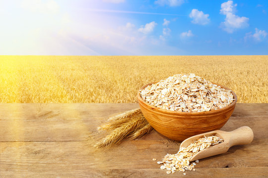 Oatmeal In Bowl With Field On The Background