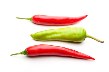 red chilli peppers on white background