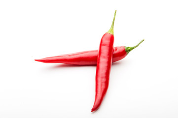 red chilli peppers on white background