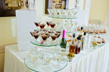Glasses with vermouth  and drinks on wedding reception