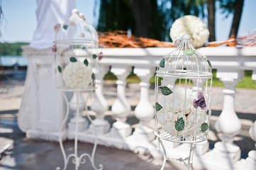 wedding arch with chairs and many flowers and decor