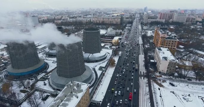 Flight over the thermal power plant TPP. Smoke from pipe.