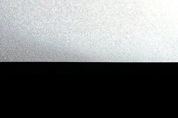 silver glitter on black background