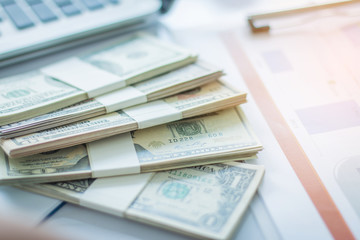 businessman get business profits of final quarter of year from investment at his office