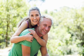 Couple smiling and holding each other