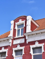 Dutch houses. View to historic facades of cobblestone and stucco.