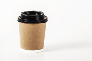 Paper cup of coffee on white background