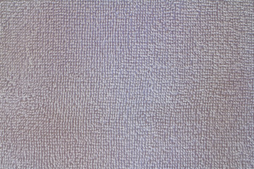 Fototapeta na wymiar Gray natural cotton towel background, closeup photo texture