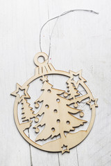 Wooden christmas decoration on white background