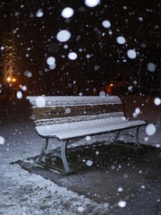 snowfall in the city at night