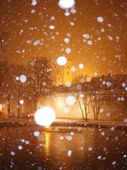 snowfall in the city at night