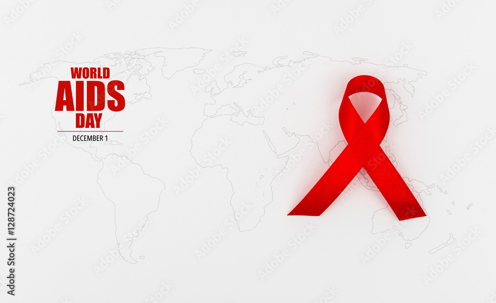 Wall mural aids awareness red heart ribbon on world map .