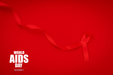 Aids Awareness Red heart Ribbon on red background .