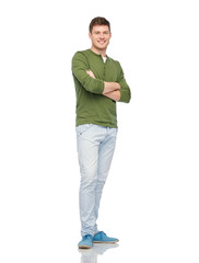 Fototapeta premium smiling young man over white