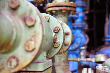 old, industrial pipes in bad condition. Selective focus.