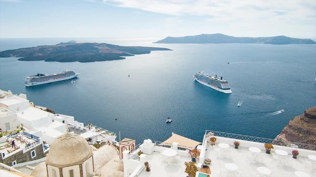 Santorini Greece Scenic View from Greek Buildings Over Mediterranean Ocean with Visiting Cruise Ships Anchored Off Shore