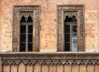 Old window in palace on Piazza Sordello The historic city center of Mantova Lombardy .Italy