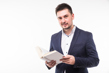 Happy smiling guy in suit holding book and looking at camera over white background