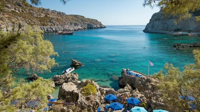 Anthony Quinn Bay in Rhodes Greece with Clear Blue Mediterranean Sea Water in a Natural Bay at the Popular Tourists Destination