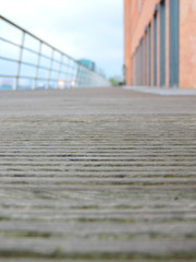 Wooden bridge or gangway with selective focus and copy space.