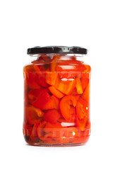 Canned vegetables in glass jars isolated on white background