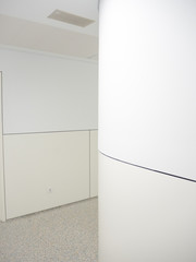 Hospital hallway with white and cream walls