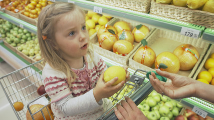 Family makes purchases in the supermarket