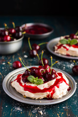 meringues pavlova cake with fresh cherry