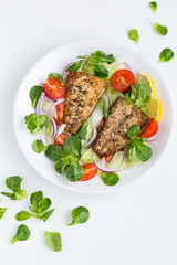 roasted mackerel fish with fresh salad,