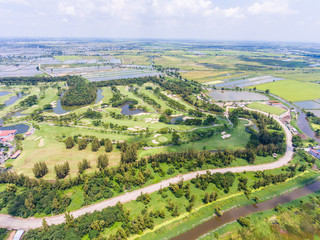 Fototapeta na wymiar Aerial view of a beautiful green golf course.