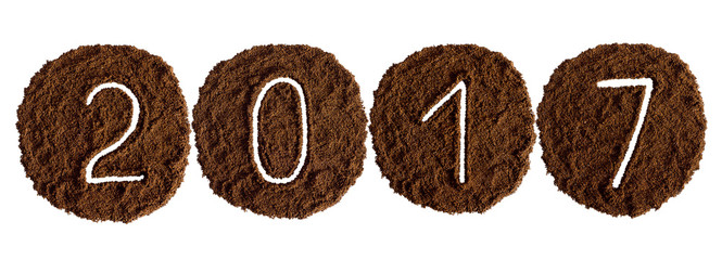 2017 decorated with ground coffee on white background