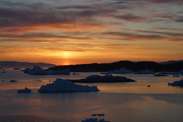 sunset time to arctic ocean in Greenland