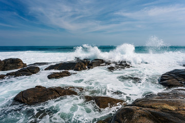 Massive rolling waves crashing into the rocks near Margaret beach, Western Australia