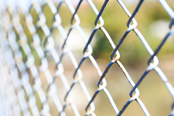 Fototapeta premium Tied together with iron mesh fence.