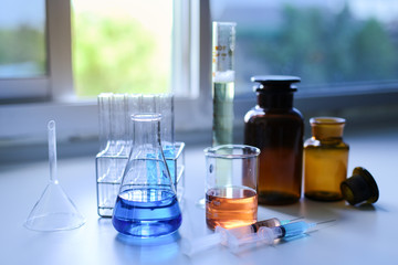 Laboratory glassware, bottle, flasks for experiment in lab.
