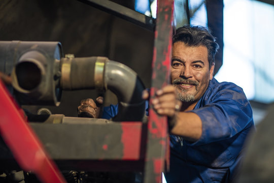 Mechanic working at fire brigade workshop, portrait