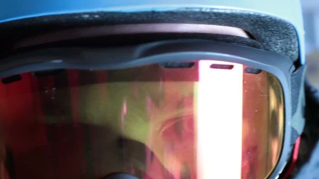 Close up shot of ski googles being put on